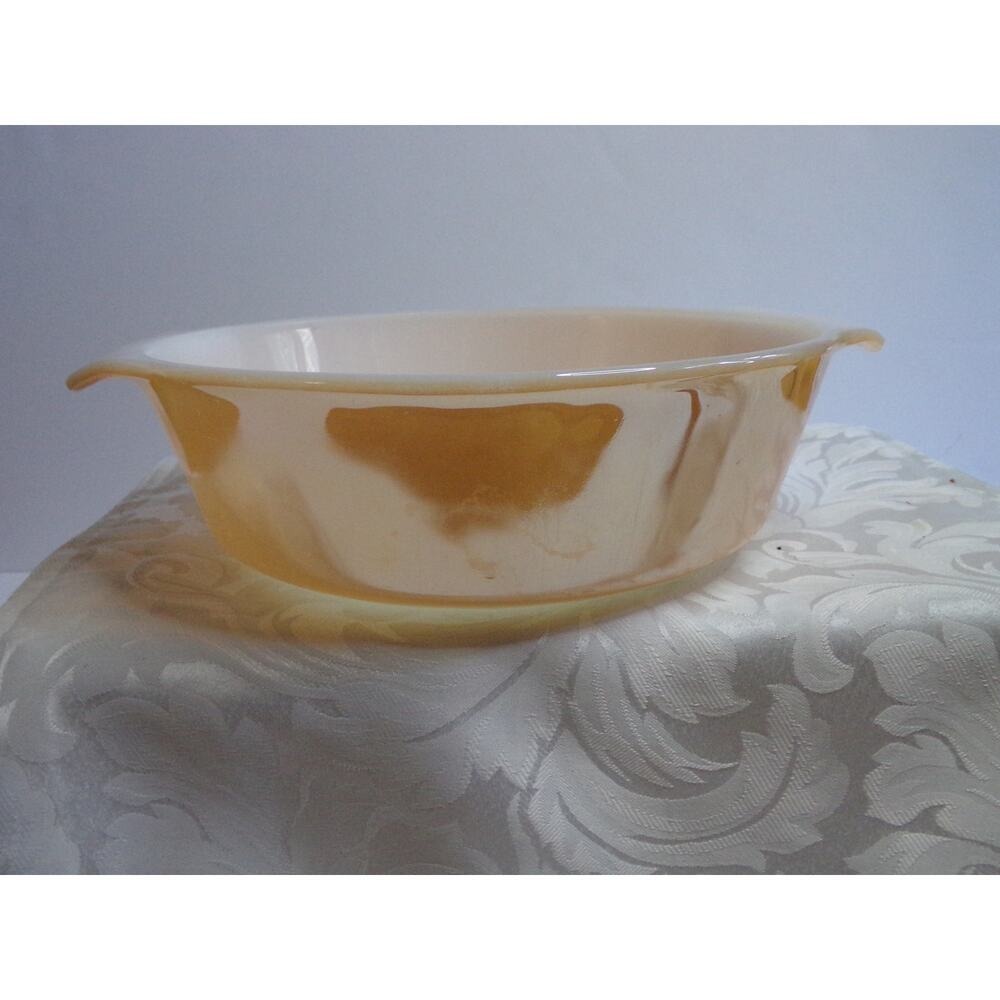 Anchor Hocking Fire King Peach Lustre 1 1/2 quart casserole. One chip on handle